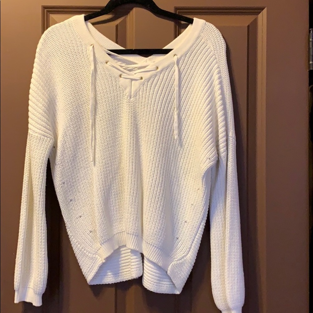 White lace up sweater.
